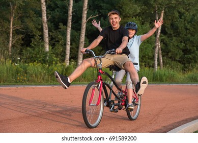 two people riding bike