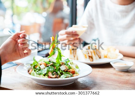 two people having a business meeting over lunch
