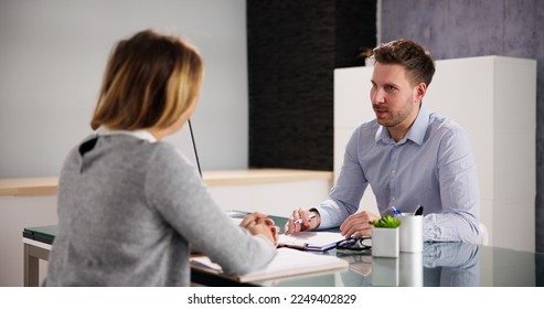 Two People Interview Meeting In Office. Hire Employee - Shutterstock ID 2249402829