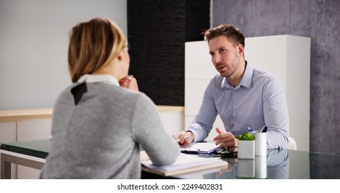 Two People Interview Meeting In Office. Hire Employee - Shutterstock ID 2249402831