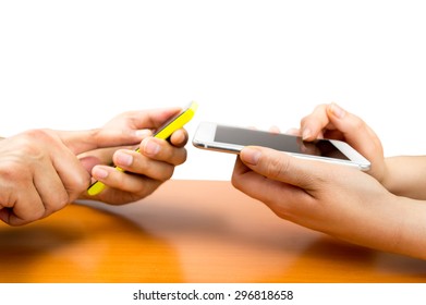 Two People With Smart Phones Connecting With Wifi Isolated On White Background