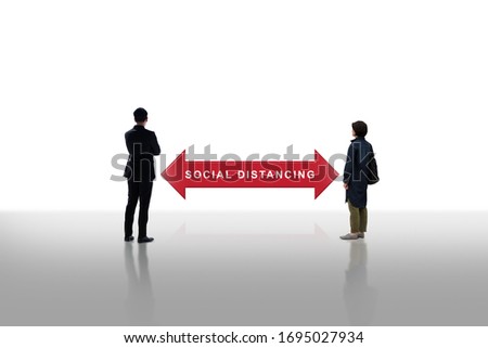 Two people standing keep distance with the word social distancing in arrow  between concept, New normal concept, People keeping distance for infection risk and disease Coronavirus.