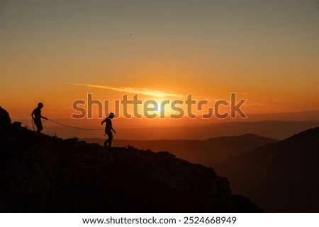 Similar – Image, Stock Photo Two people on hill Man