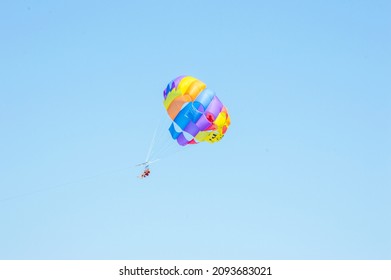 Two Person Enjoying The Parasailing At Akti Kanari Beach Greece