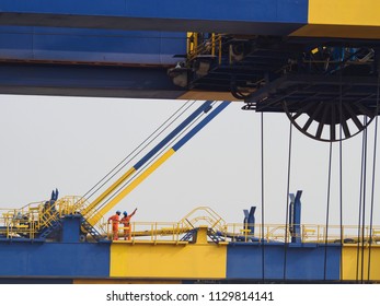 Two Persons On Port Crane In Nhava Sheva Port.