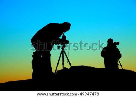 Similar – Silhouette der Fotografen auf den Bergen