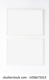 Two picture frames with copyspace isolated on white background. Mockup with copyspace