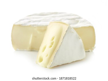 two pieces of fresh brie cheese isolated on white background, selective focus