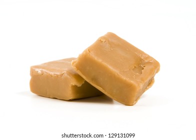 Two Pieces Of Fudge Isolated On White Background