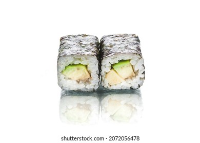 Two Pieces Of Japanese Vegan Maki Sushi Roll With Nori Seaweed On Top. Avocado Inside Roll. Side View Of Asian Veggie Roll Isolated On White Background. Copy Space Menu Image With Reflection 