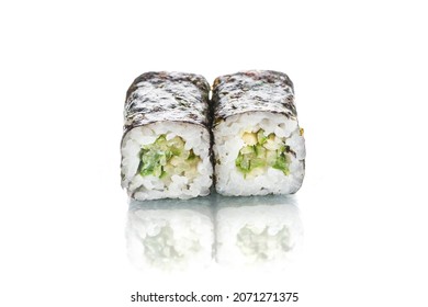 Two Pieces Of Japanese Vegetarian Maki Sushi Roll With Nori Seaweed On Top. Cucumber Inside Roll. Side View Of Asian Veggie Roll Isolated On White Background. Copy Space Menu Image With Reflection 