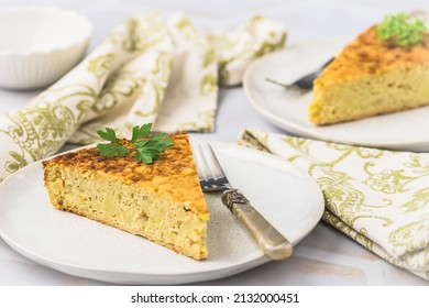 Two Pieces Of A Potato Cake, Spanish Tortilla, Frittata, On White Background