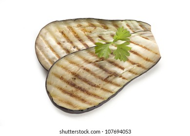 Two Pieces Of Roasted Eggplant With Parsley