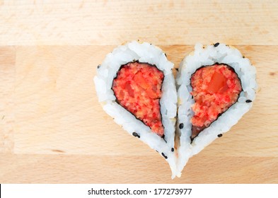 Two Pieces Of Sushi Forming The Heart Shape