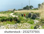 two pilgrims making the Way of St. James along the coast from Portugal