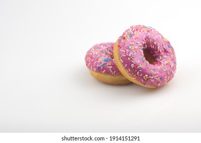 Two pink donuts on a white background - Powered by Shutterstock