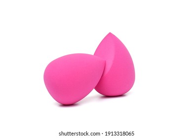 Two pink makeup sponges on a white background