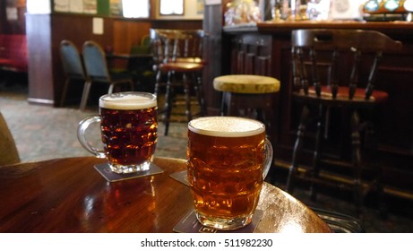 Two Pints Of Beer On The Table Of An Pub In England