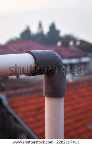 Two Pipes Connected with a Connecting Pipe