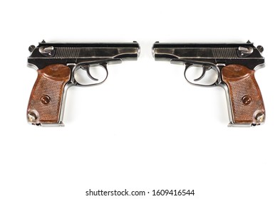 two pistols are located on a white background
