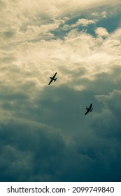 Two planes of the second world war split the sky