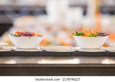 Two Poke-bowls On A Sushi Conveyor Belt