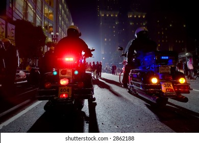 Two Police Officers On Motorcycles In A Night City. - Powered by Shutterstock