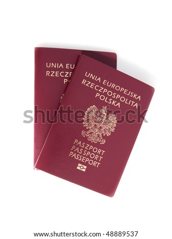 Two Polish passports on a white background.
