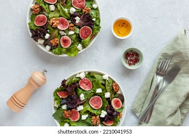 Two Portion Of Fig, Salad Leaves, Feta And Walnuts Salad, Overhead