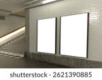 Two portrait posters in a train station underpass.