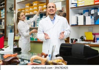 Two positive european orthopedists working in special store with orthopaedic goods - Shutterstock ID 396782425