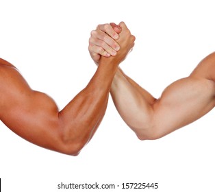 Two powerful men arm wrestling isolated on a white background