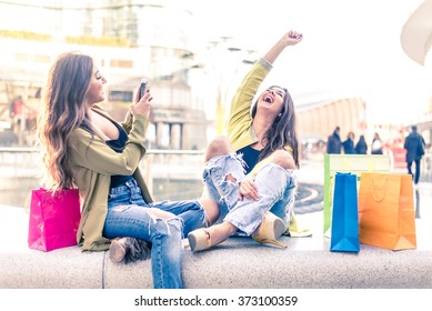 Two Pretty Girls Having Fun While Shopping Outdoors - Best Female Friends Spending Time Together