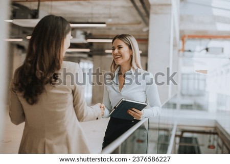 Similar – Image, Stock Photo Two pretty young woman having fun on the seaside