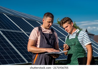 Two Professional Contractors Discuss Final Result Of Solar Panel Installation