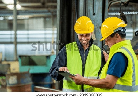 Two professional engineer worker technician assistant in helmet inspection check old machine construction factory with colleague manager. check old machinery production construction operating