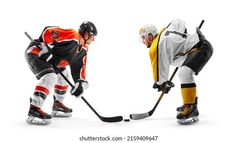 Two professional hockey players start the game. Fight for the puck. Sports emotions. Hockey concept. Isolated - Powered by Shutterstock