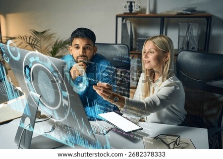 Two Professionals Collaborating On Data Analysis, Using Advanced Holographic Technology, Harnessing Innovation, Teamwork And Efficiency In A Modern Office Setting