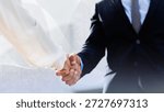 Two professionals shaking hands, symbolizing partnership and agreement. Business attire, handshake, partnership, and agreement are key themes in this image. Corporate business image.