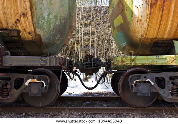 two rail tank cars in\
the rail depot