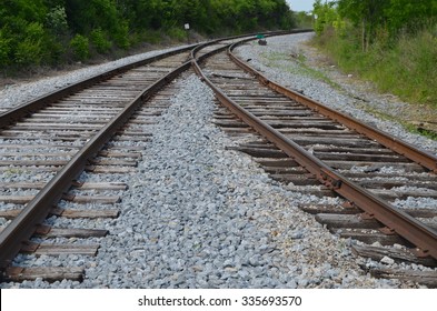 Two Railroad Tracks Merge Into One. 