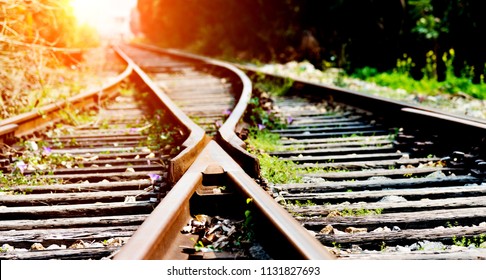 Two railway tracks merge together. - Shutterstock ID 1131827693