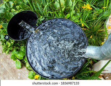 Two Rainwater Collection Tanks With Overflow