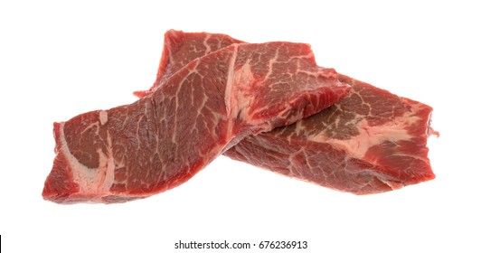 Two Raw Beef Boneless Short Ribs Isolated On A White Background.