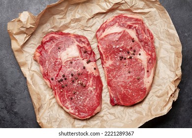 Two Raw Ribeye Beef Steaks. Top View Flat Lay