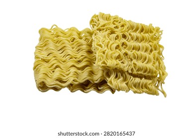Two rectangular blocks of dry, wavy, yellow instant ramen noodles arranged on a white background, showing the texture of the dehydrated wheat strands.