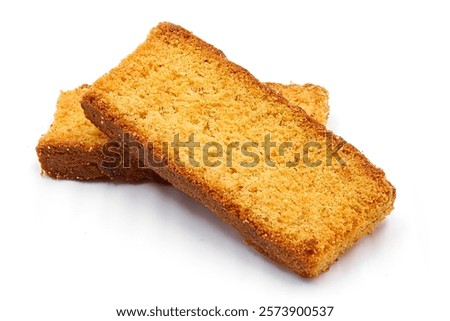 Two rectangular rusks, light and crisp, perfectly browned edges.
