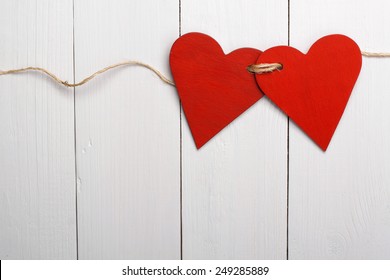 Two Red Hearts Tied Together