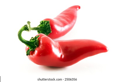 Two Red Hot Jalapeno Peppers Over White