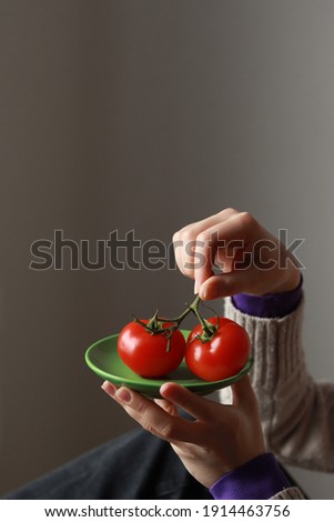 Similar – Woman holds strawberries in her hands